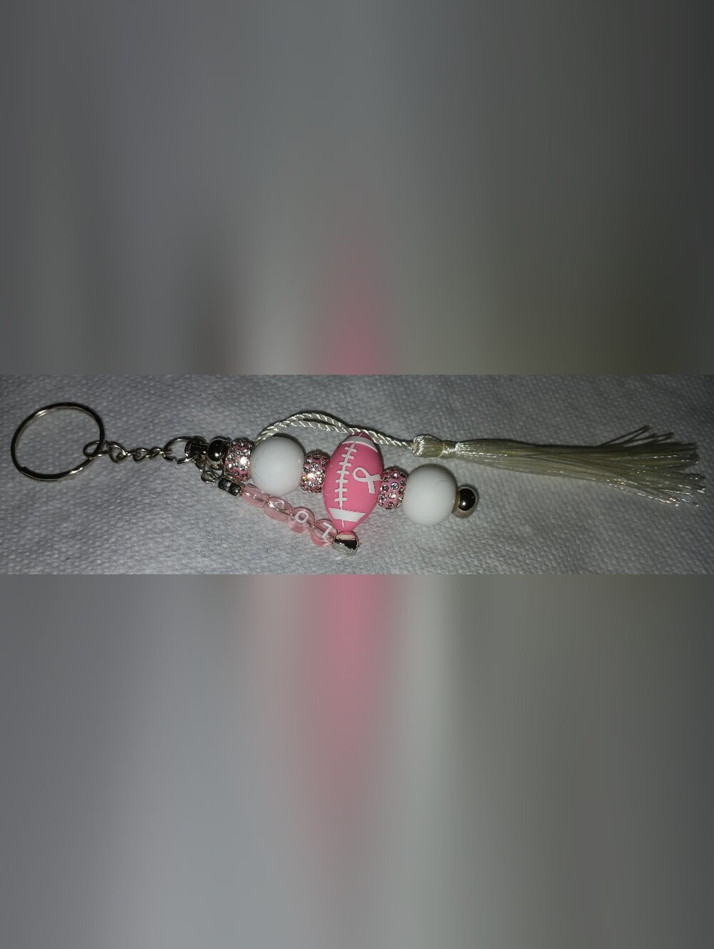 NWT Handcrafted Breast Cancer Awareness Pink Football Charm Keychain w/Tassel.